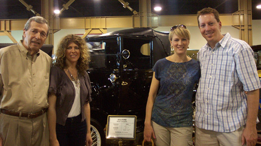 Dad, Tami, Tina and Todd in front of an early Ford Model T.